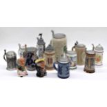 Group of assorted German tankards, all with hinged pewter covers, to include souvenir examples,