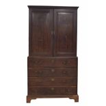 Welsh 18th century oak secretaire cupboard, the two panelled cupboard doors enclosing a shelved