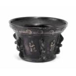 18th century ribbed mortar, decorated with rosettes and figures, 5" diameter, 3" high