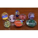 Eight assorted decorative glass paperweights (8)
