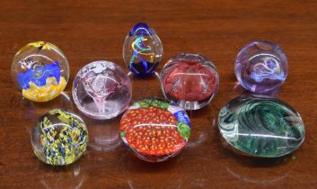 Eight assorted decorative glass paperweights (8)