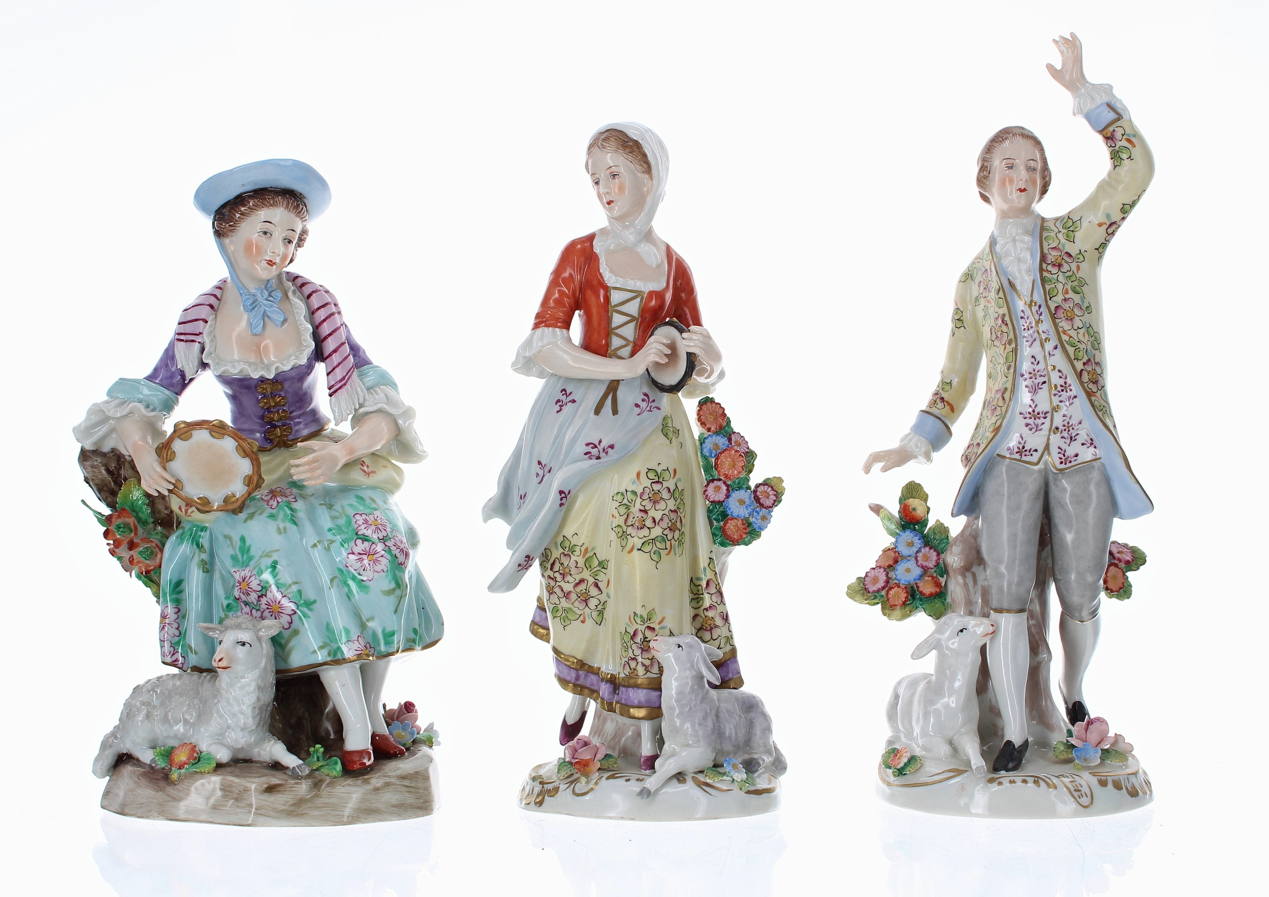 Pair of Sitzendorf porcelain figures of a shepherd and shepherdess, tallest 8" high; together with