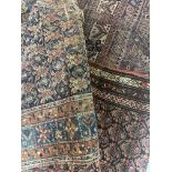 Group of three small Persian pattern and a small Persian pattern runner (all at fault damaged and