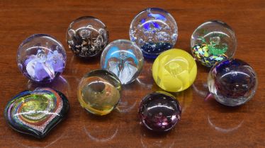 Ten assorted decorative glass paperweights (10)