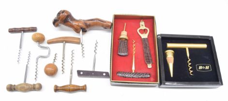 Group of assorted wooden handle direct pull corkscrews; together with a B&H pull and stopper set and