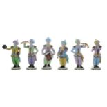 Set of six Sitzendorf porcelain Turkish child band figures, each with blue factory mark to the