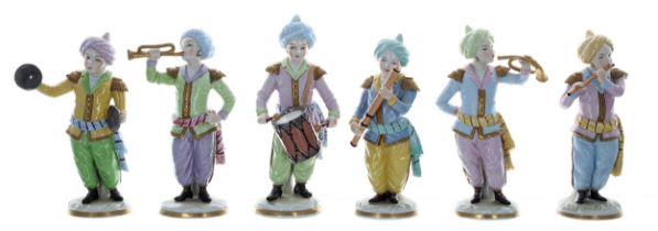 Set of six Sitzendorf porcelain Turkish child band figures, each with blue factory mark to the