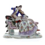 Sitzendorf porcelain figural group of a gentleman playing a violin serenading a lady reclining on