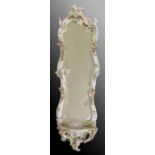 Late 19th century German porcelain framed wall mirror, the frame encrusted with flowers, the