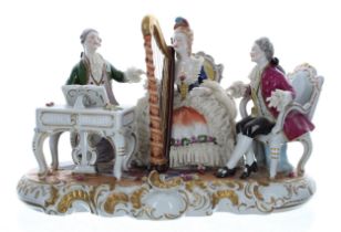 Unterweissbach porcelain figural group interior scene, modelled a gentleman seated by a spinet, a
