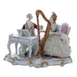 Unterweissbach porcelain figural group interior scene, a lady playing a harp and a gentleman at a