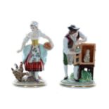 Pair of Sitzendorf porcelain figures, modelled as a girl feeding chickens and a boy feeding a rabbit