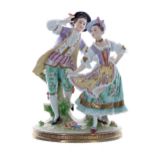 Sitzendorf porcelain figural group of a dancing couple, on an oval floral encrusted base highlighted