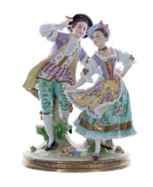 Sitzendorf porcelain figural group of a dancing couple, on an oval floral encrusted base highlighted