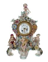 Attractive Sitzendorf porcelain mantel clock, the case with four putti figures representing the