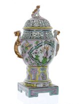 Dresden Potschappel porcelain vase and cover, the cover with reticulated panels and a gilt dog
