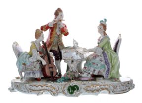Large Sitzendorf porcelain figural group interior scene, with a lady playing a 'cello, a gentleman