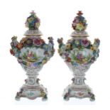 Pair of Dresden Potschappel porcelain vases with covers, the covers having floral encrusted knobs,