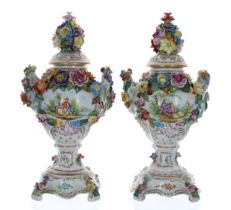 Pair of Dresden Potschappel porcelain vases with covers, the covers having floral encrusted knobs,