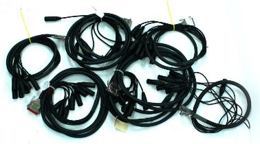 Five Mogami gold DB25 to XLRM audio cables; together with an Apogee Electronics DB25 to XLRM