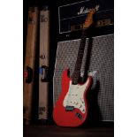 1961 Fender Stratocaster electric guitar, made in USA; Body: Fiesta red refinish, lacquer checking