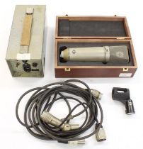 Neumann U67 large diaphragm tube condenser microphone, within a fitted wooden box, with power supply