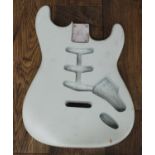 S Type guitar body roughly finished in surf blue