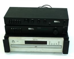 Rotel RCC-1055 CD multi-disc changer; together with a Creek Audio Systems CAS3140 FM stereo tuner