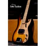 1957 Fender Precision Bass guitar, made in USA; Body: two-tone sunburst finish, lacquer checking