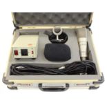 ADK Model TC condenser microphone, within a fitted hard case with DJ-8 power supply, a stand