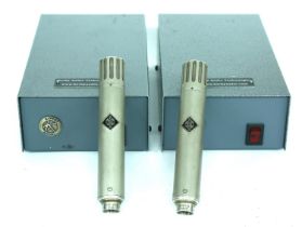 Pair of Neumann KM54A condenser pencil microphones, each with PSU and cable  *Please note: