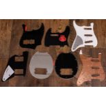 Seven assorted electric guitar pickguards (7)