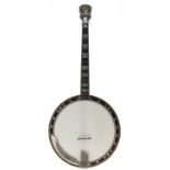 Jerry Webb tenor banjo, bearing the maker's trademark brass plaque screwed to the inside pot wall
