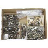 Very large quantity of mainly nickel mounted button screw adjusters; also a small quantity of bone