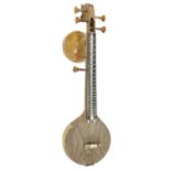 Saraswati Veena, with fluted carved bowl back, the table carved in symmetry with two opposing