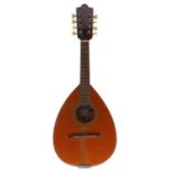 Spanish mandolin labelled Guitarras Goya, Modelo 14..., with pear shaped banded body and spruce