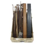 Quantity of old bows, some unfinished, mainly violin bows; also two old wooden bow cases