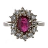 Impressive 18ct white gold ruby and diamond oval cluster ring, the ruby 1.53ct, round brilliant-