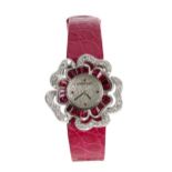 Audemars Piguet 18ct white gold ruby and diamond petal design lady's wristwatch, C82909, the