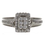 Attractive 9ct white gold diamond cluster ring with set shoulders, 0.32ct in total, width 10mm, 3.