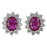 Good pair of modern 18ct white gold large oval ruby and diamond cluster stud earrings, the rubies