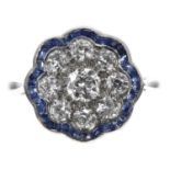 Art Deco style 18ct white gold scallop-edged old-cut diamond and sapphire halo ring, the diamonds