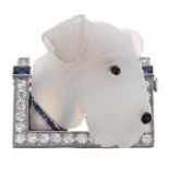 Novelty white metal rock crystal dog brooch, modelled as an Airedale with an onyx set eye and