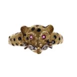 18ct leopard design ring, with black enamel spots, ruby set eyes and diamond set whiskers, width