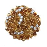 18ct yellow gold and diamond floral design circular clip brooch, signed Edward, Glasgow, set with