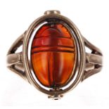 Antique gold carnelian set swivel intaglio ring, carved depicting a pig in an oval mount, width