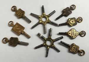Seven assorted trade advertising pocket watch keys, also two 'spider' watch keys (9)