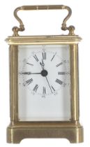 Miniature carriage clock timepiece with centre seconds, within a brass corniche case, 4" high