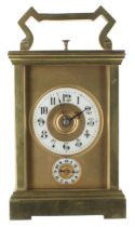 Good repeater carriage clock with alarm, the movement striking with three hammers on a gong, the 1.