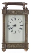 Carriage clock timepiece, within an ornate fluted pillared case decorated with foliate bands, 6.
